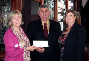 Glenn White, IADC North Sea Chapter chairman, presents a 4,400 check to CLAN chief executive Debbie Thomson (left). Mr White and Val Hood (right), NSC office administrator, were invited to CLAN&rsquo;s Aberdeen center so they could see for themselves how IADC&rsquo;s donation will make a difference.
